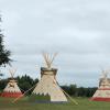 The three tipis completed and standing as part of a Native American tribute.